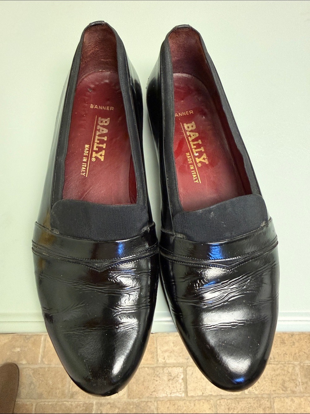 Bally Black Patent Leather Slip-On Loafers with Red Insole